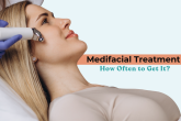 Woman receiving a medifacial treatment with a skincare device, representing Medifacial Treatment in Punjabi Bagh and guidance on how often to get it.